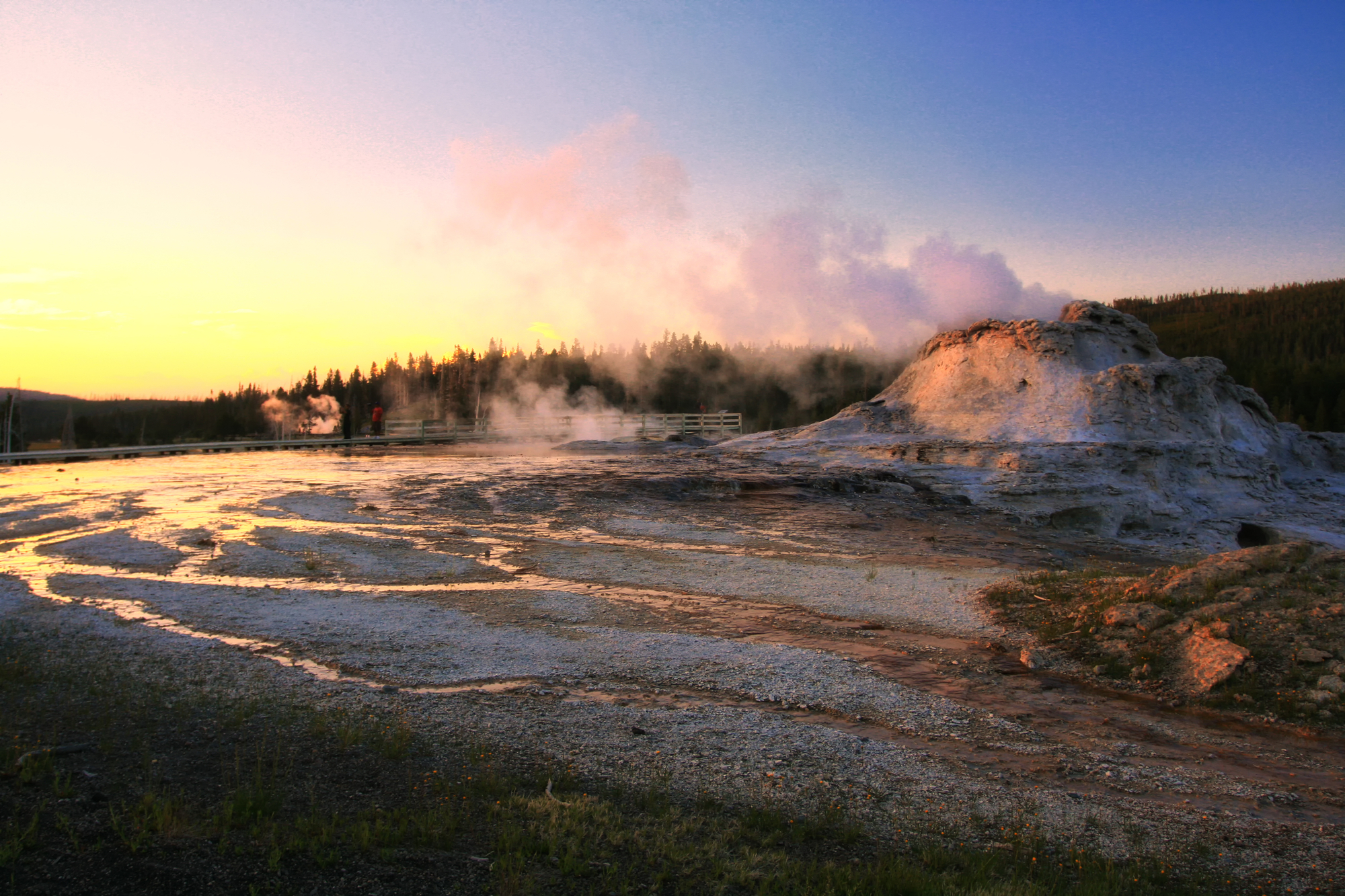 old-faithful-geyser-sunrise-reflection-yellowstone-national-park