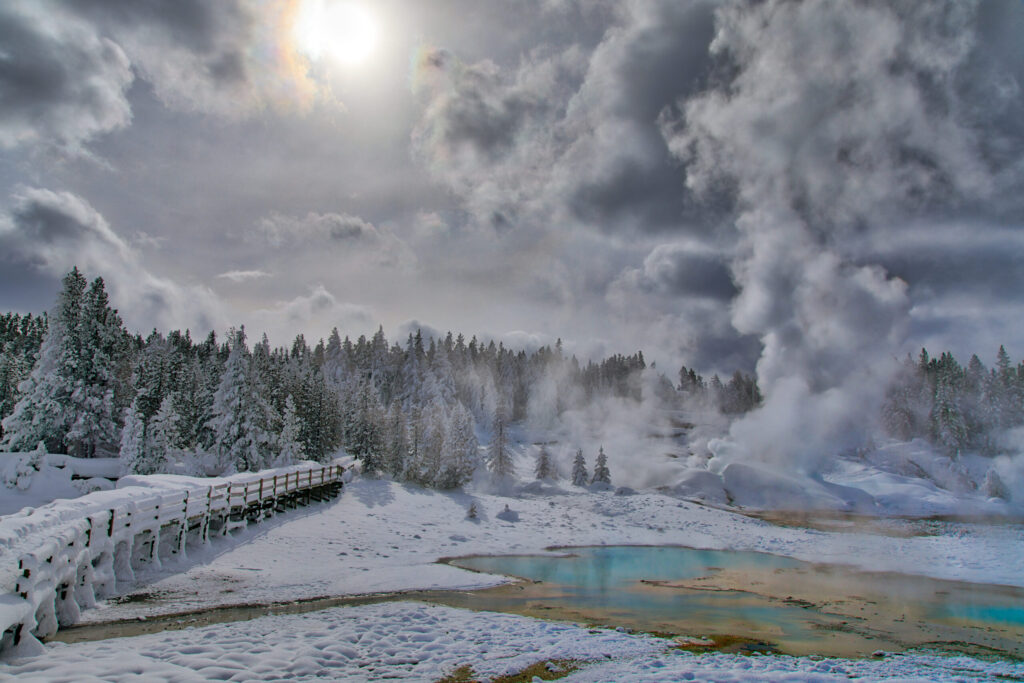 snowy-boardwalk-hot-springs-yellowstone-in-winter